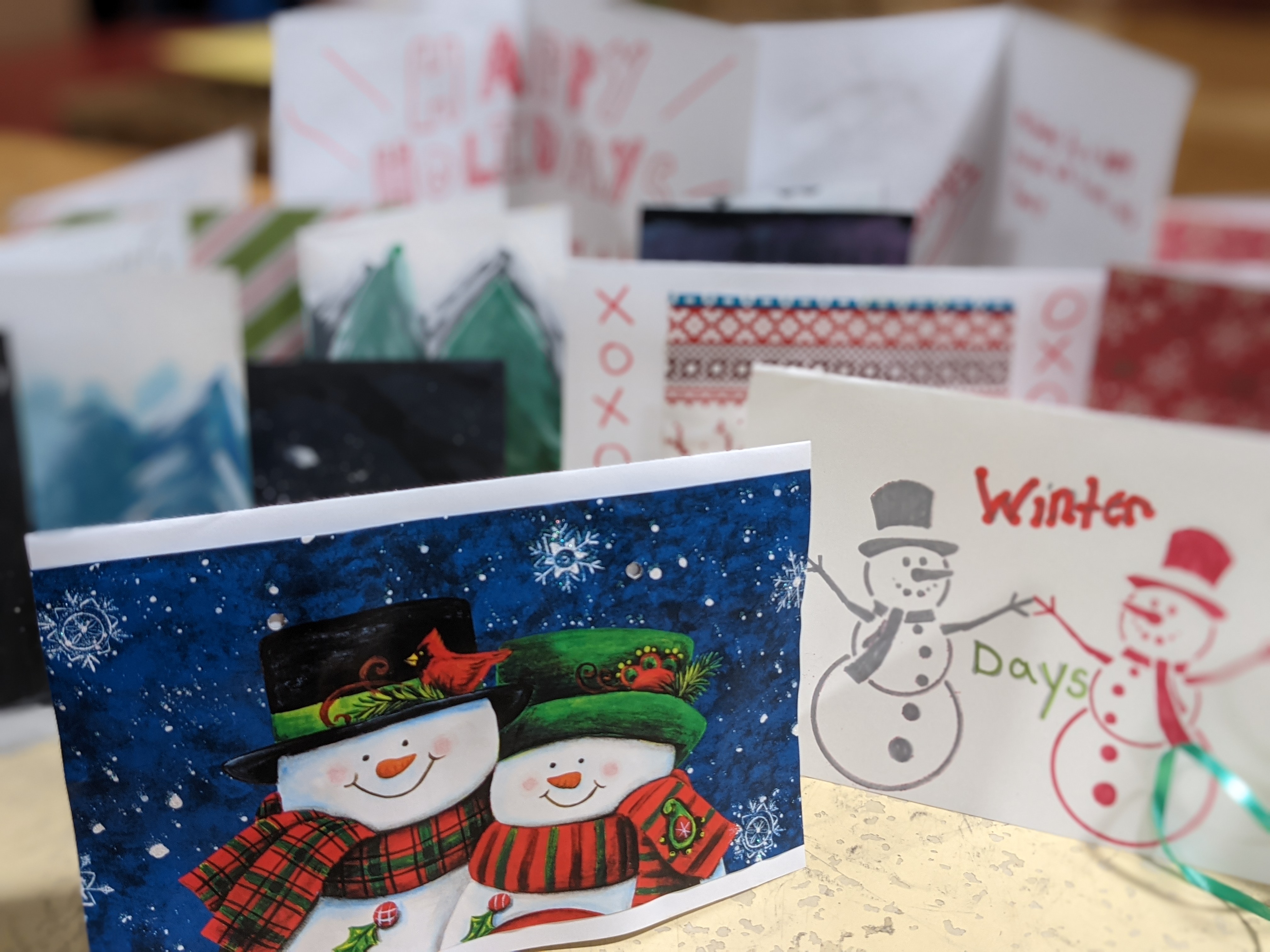 Holiday cards handmade by community members to go to seniors