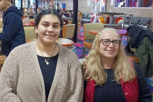 two women smiling