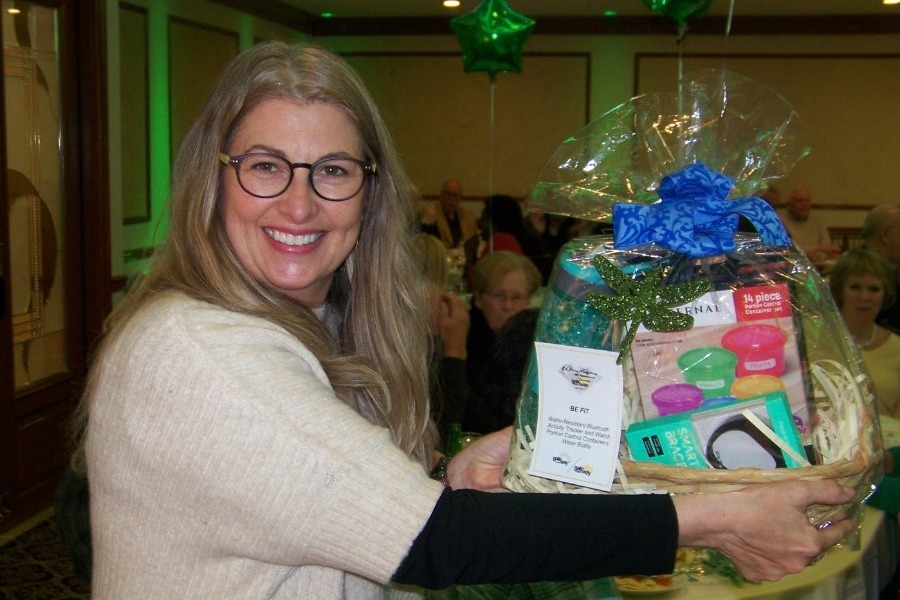 A lucky winner with a gift basket