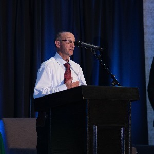 David Traver speaking at the annual NYSID awards